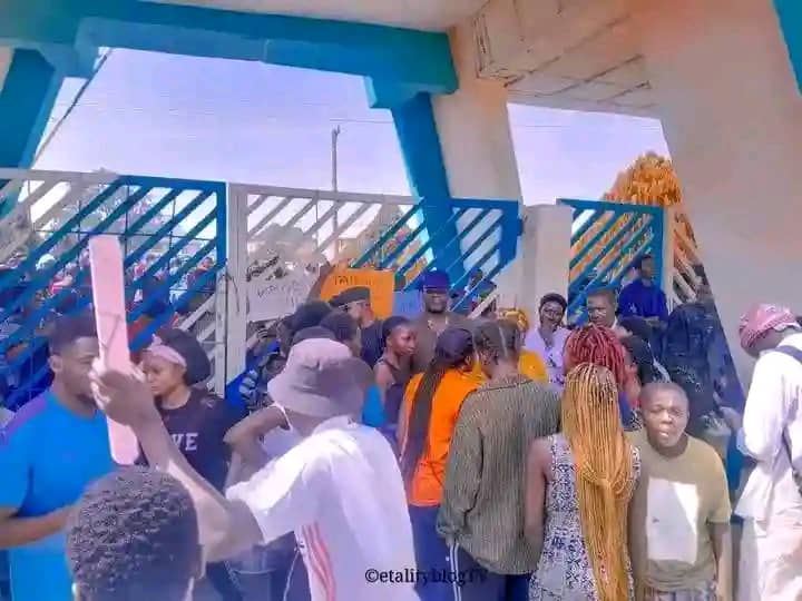 Protesting students at the school gate.